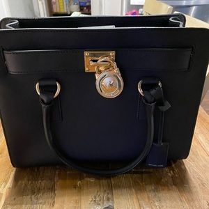 Black purse new with tags